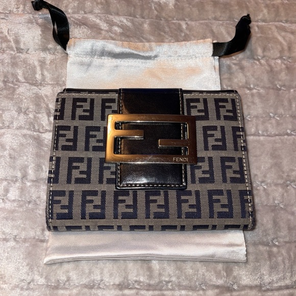 Fendi Handbags - Fendi Zucca short wallet excellent condition size is 5X3 1/2” black with silver